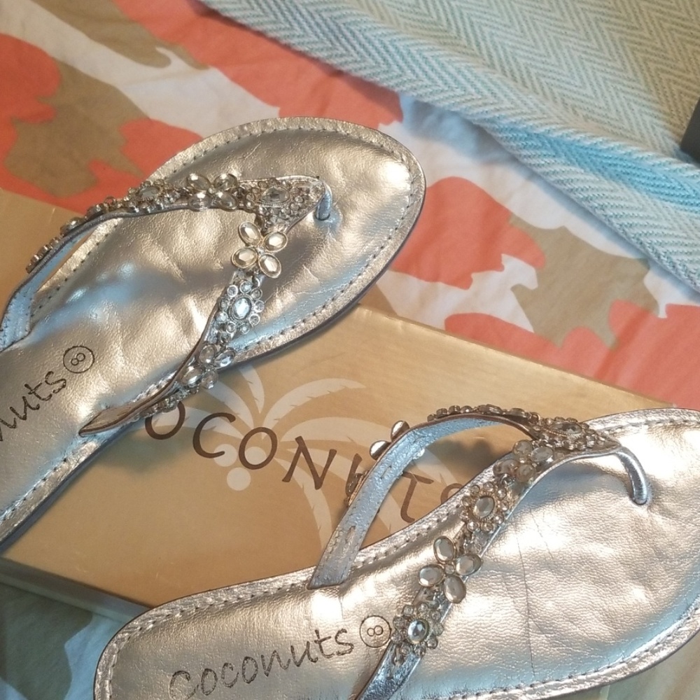 Adorable, bejeweled sandal. Size 8